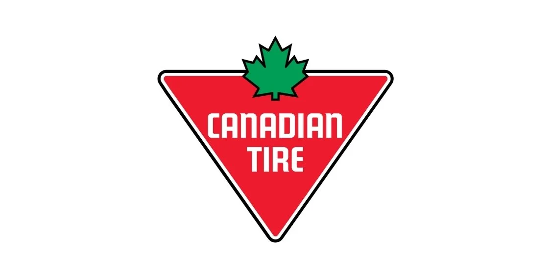 Logo of Canadian Tire featuring a red triangle with a green maple leaf on top, and the words 'Canadian Tire' in white capital letters.