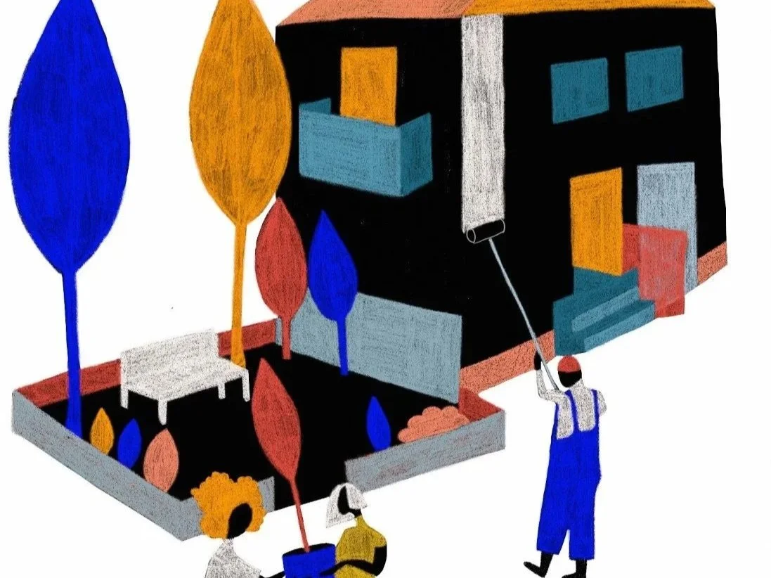 A mural painted on a black building featuring colorful trees, a white bench, and two people painting or working on the wall.