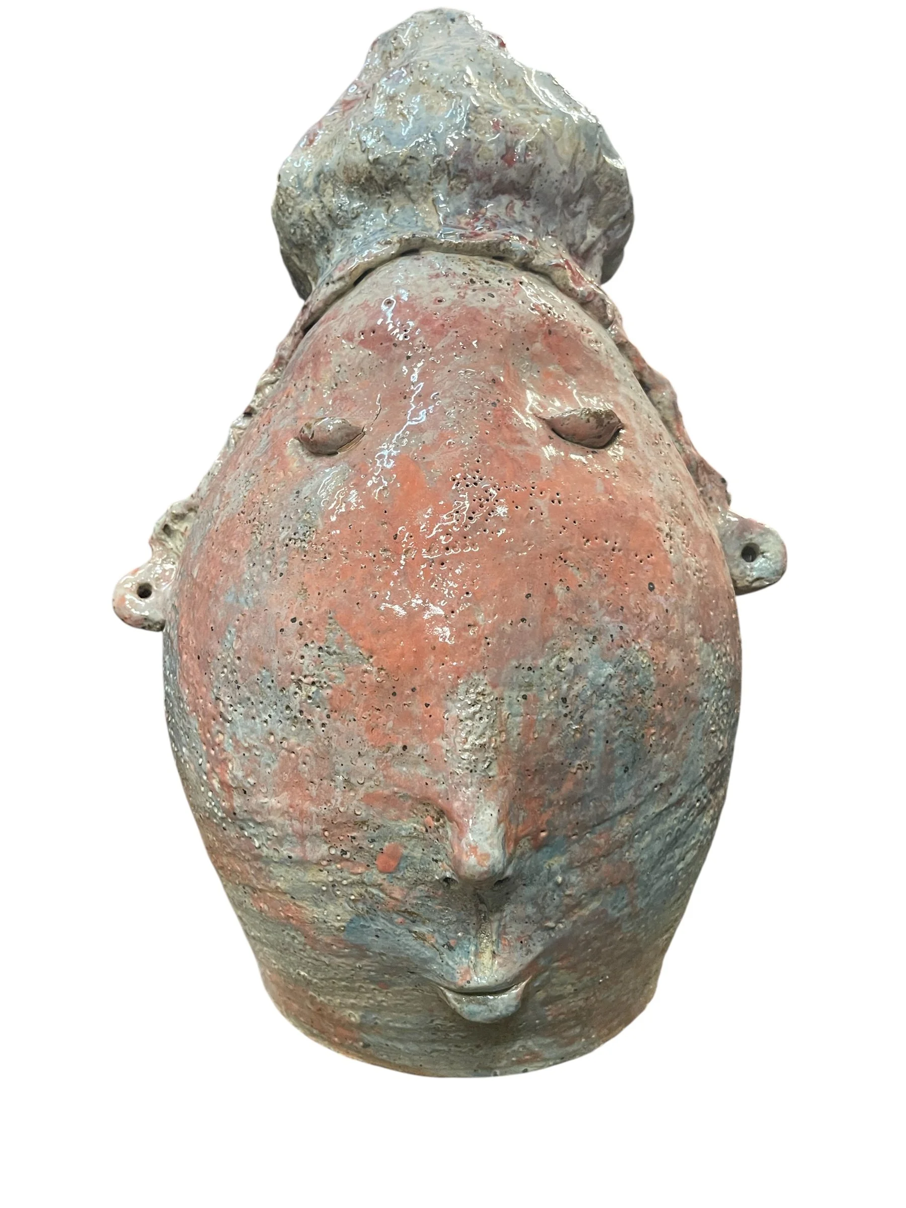 glazed ceramic sculpted head.JPEG
