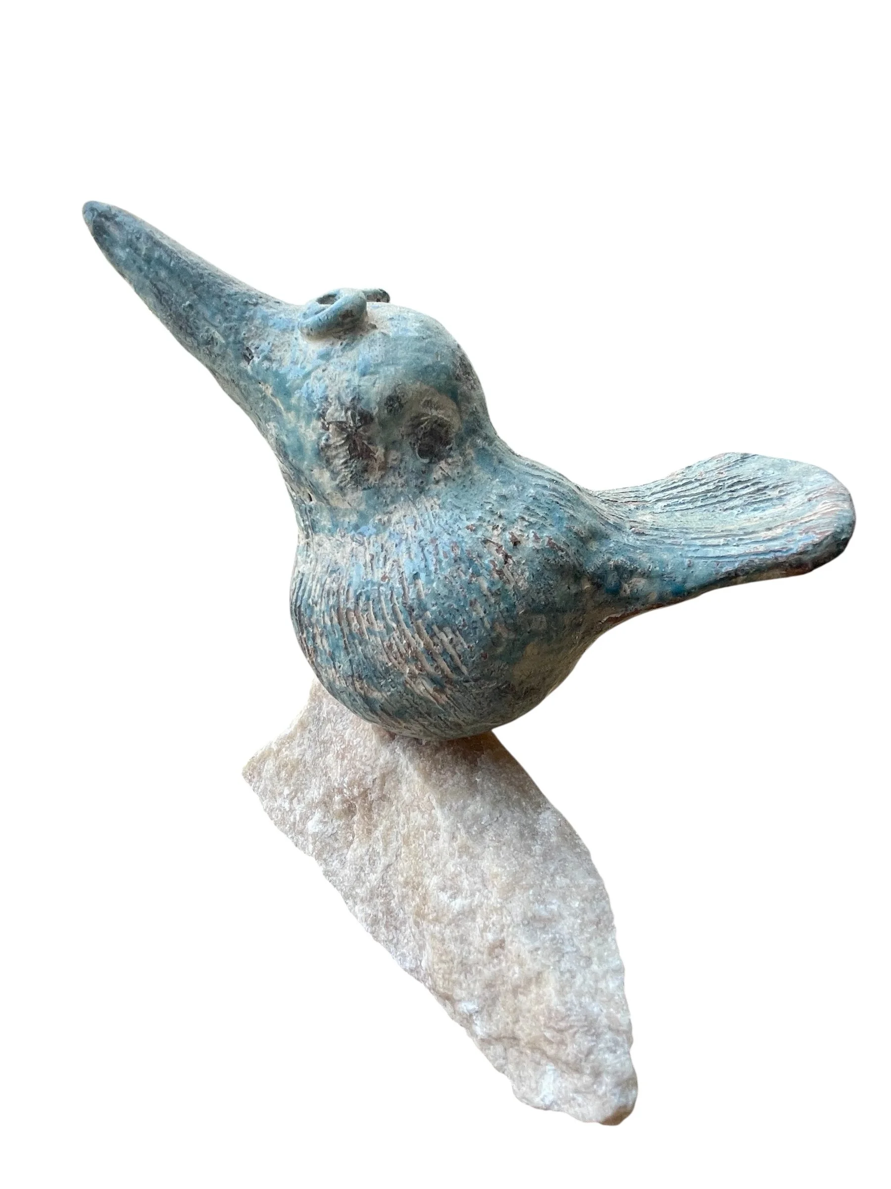 unique ceramic bird on a stone.JPG