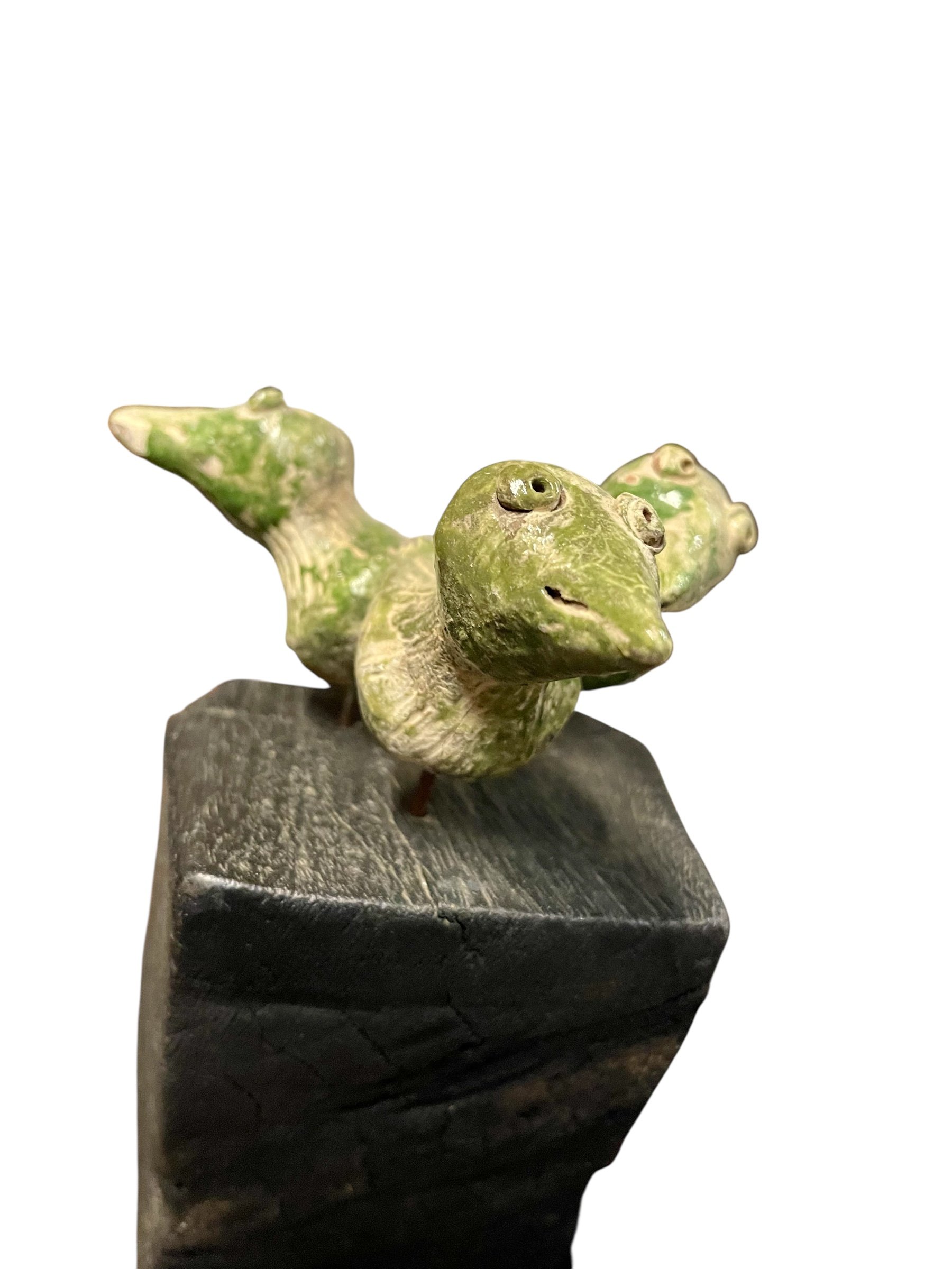 ceramic birds on an abstract wood sculpture.JPG