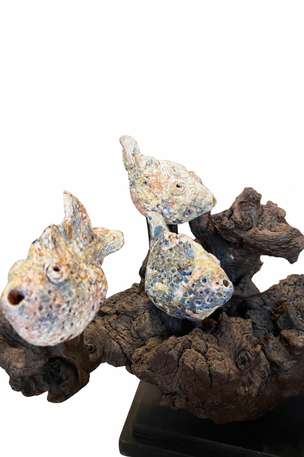 ceramic birds on a wooen branch.PNG