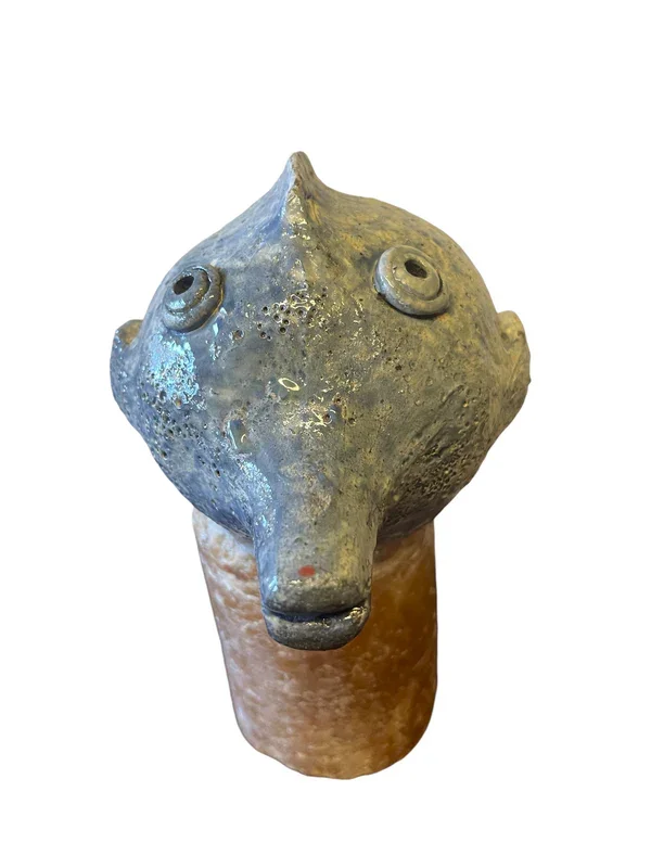 unique hand made one-of-a-kind puffer fish on a stone base.webp