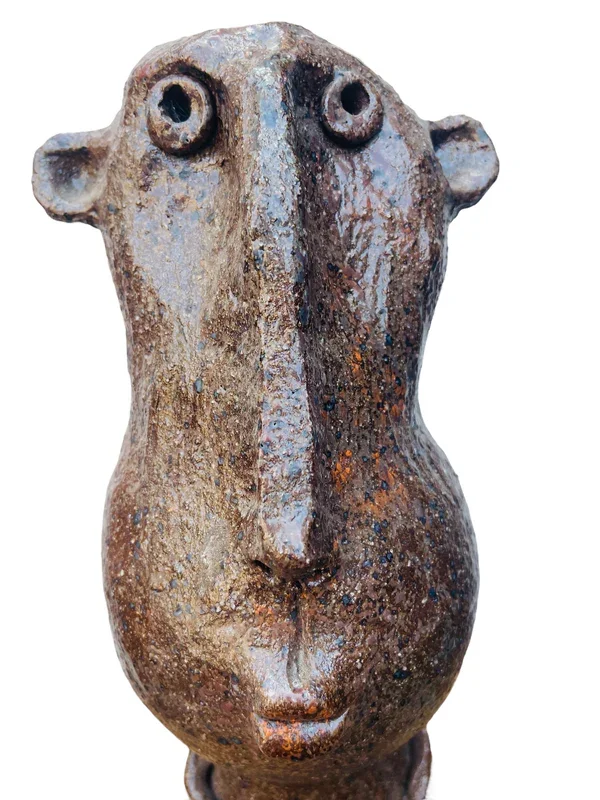 ceramic hand made whimsical man.webp