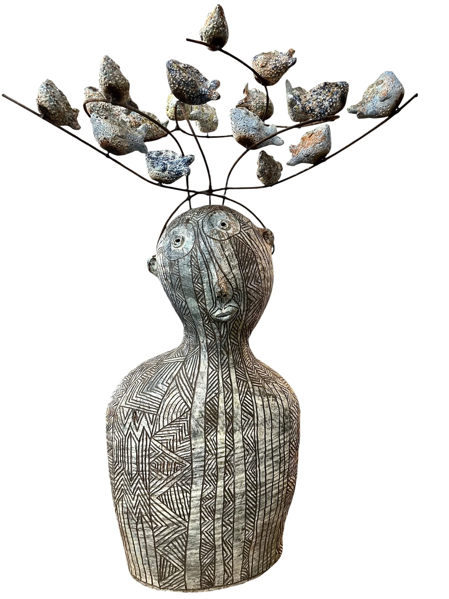 one of a kind hand made ceramic sculpture with metal work