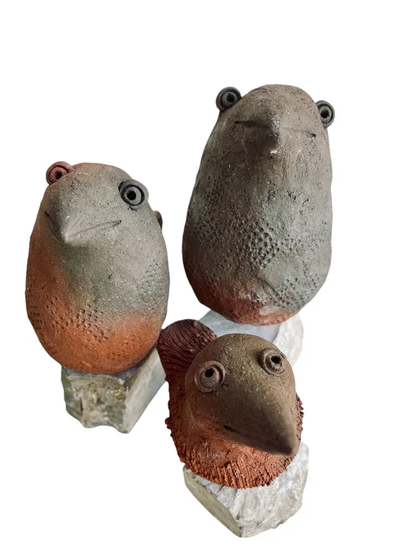 bird family ceramic sculptures.webp
