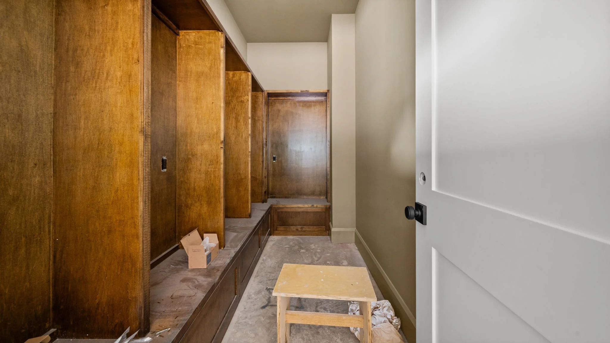 Custom closet build out stained wood cabinetry, Houston area
