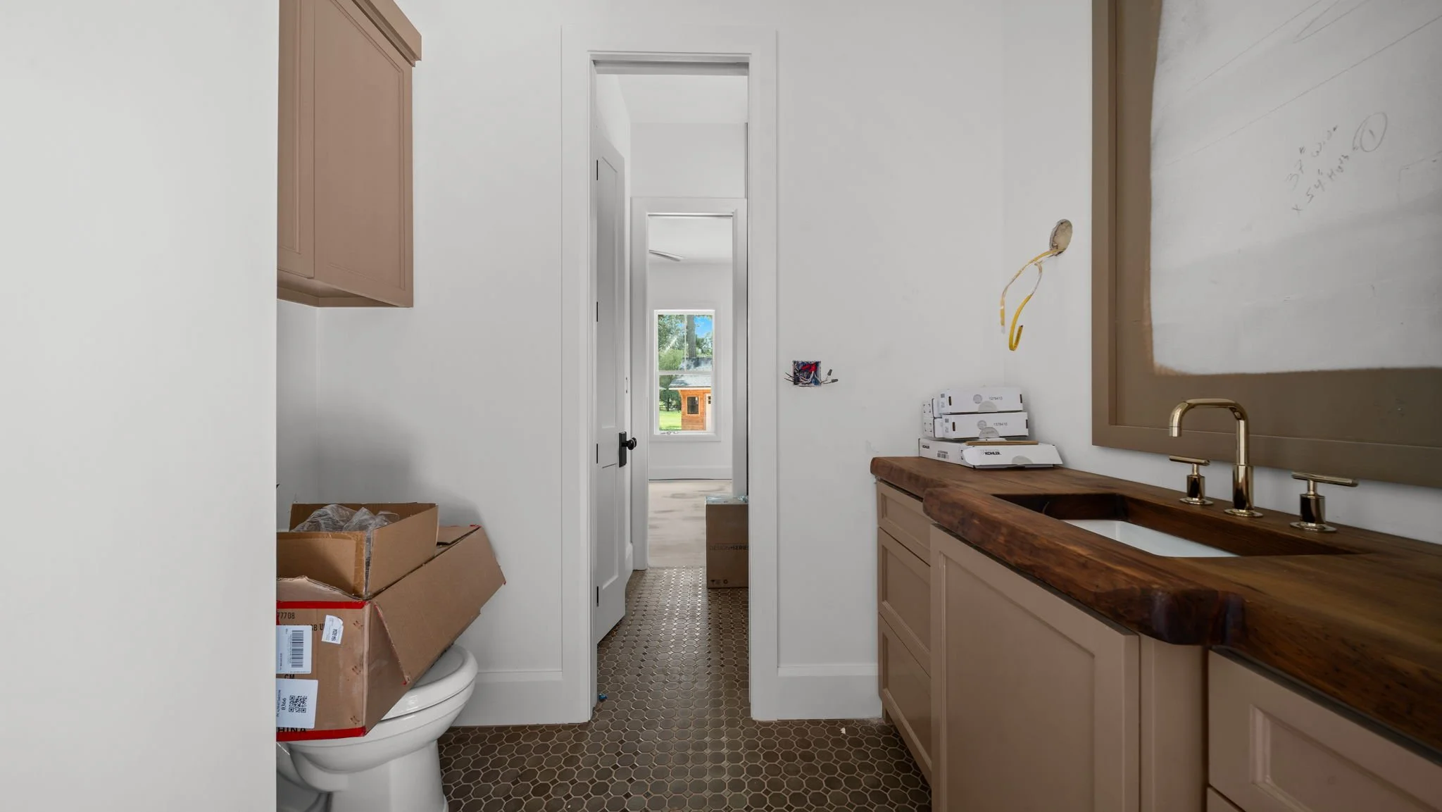 New build bathroom in progress with custom cabinetry, Houston Area 