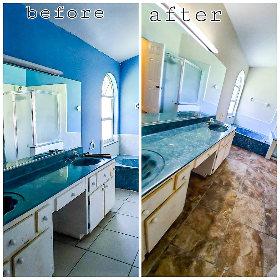 Before and after images of a bathroom renovation. The 'before' photo shows a bathroom with blue walls, a double sink with a green countertop, white cabinetry, a shower enclosure, and a small window. The 'after' photo depicts the same space with updat