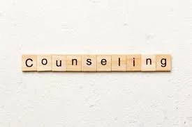 Scrabble tiles spelling 'Counseling' on a white background.