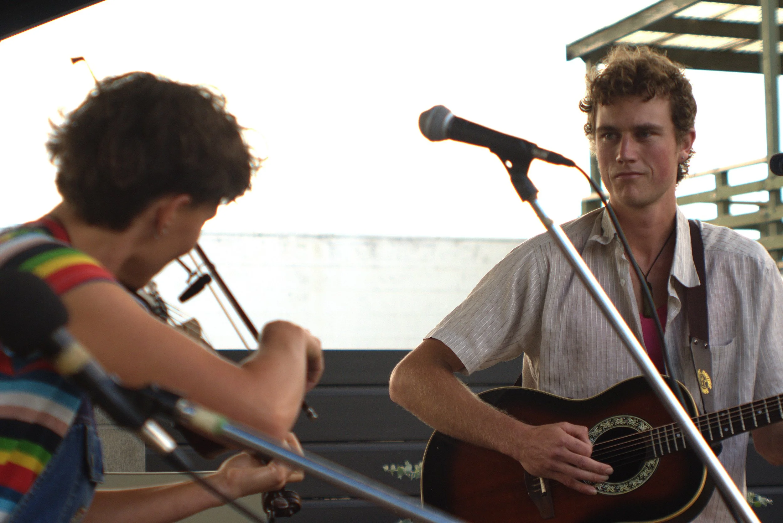 Two people playing music together