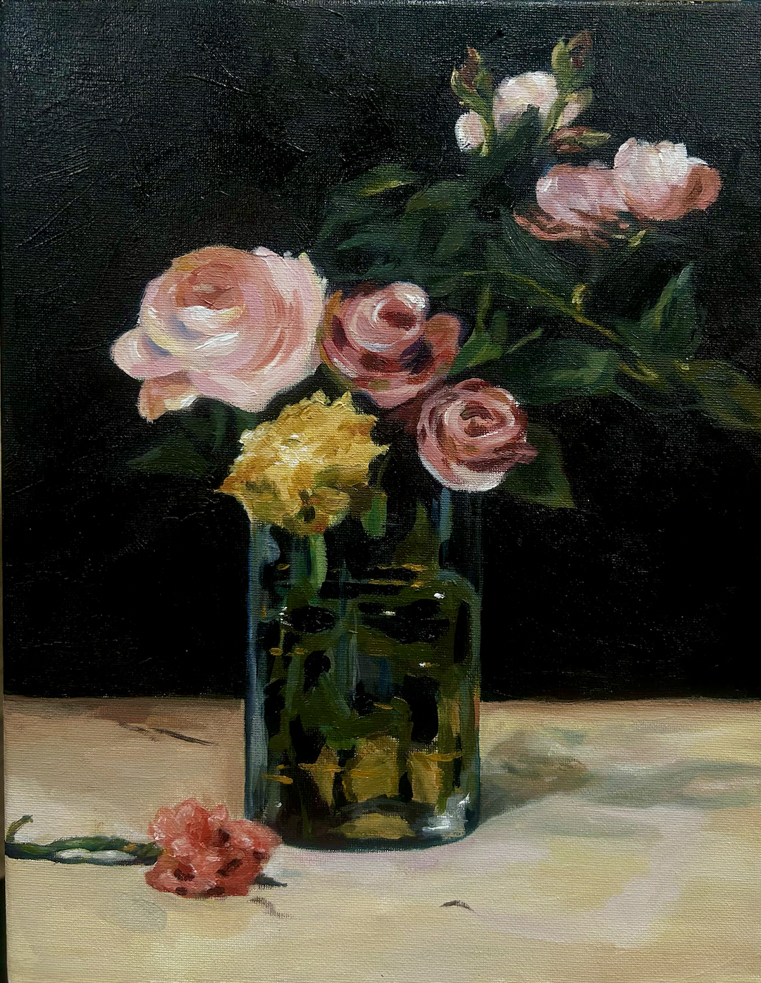 A still life painting of a pink and yellow flower bouquet in a glass vase on a table with a dark background.