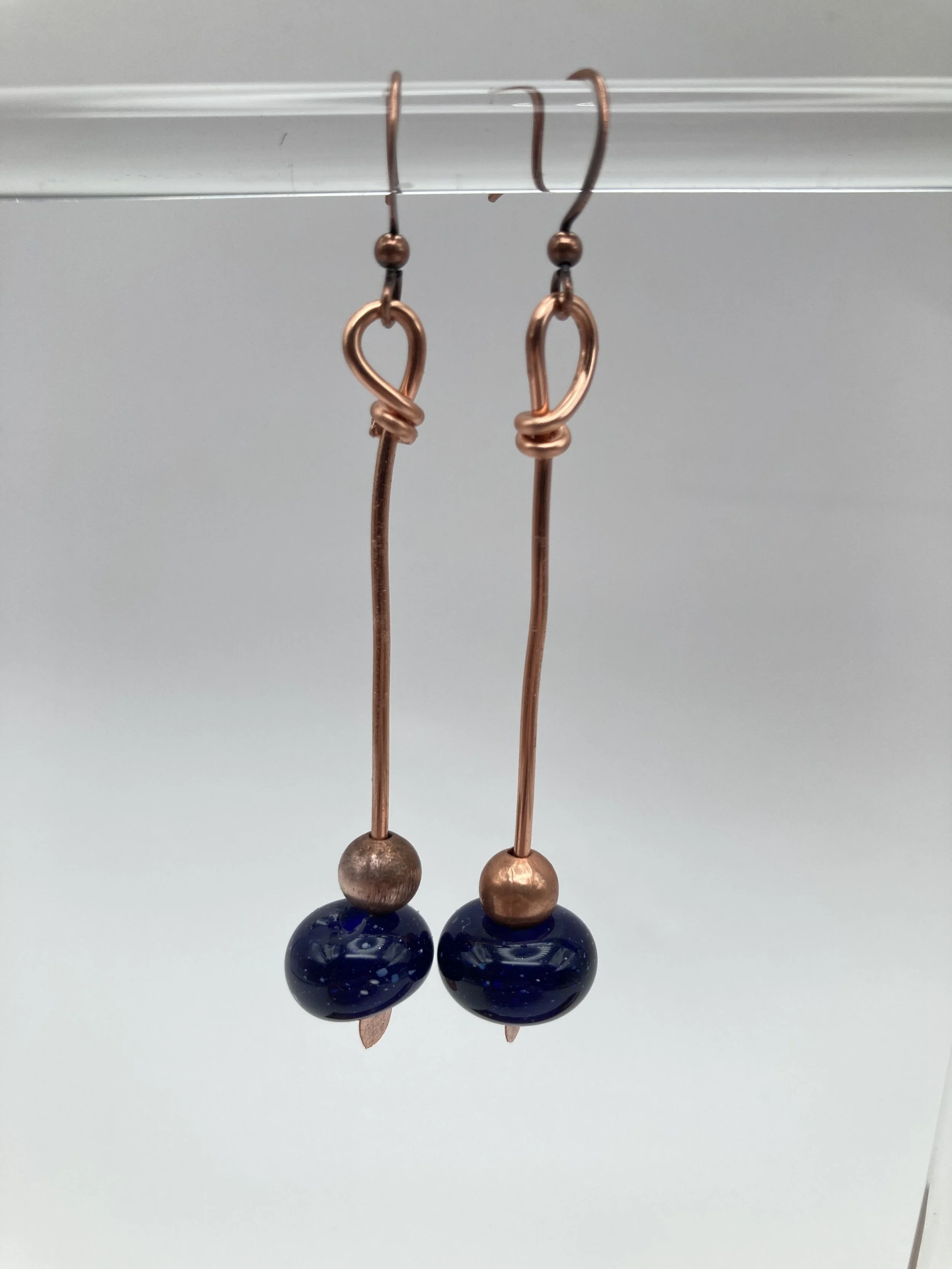 earrings w dark blue glass beads on copper wire