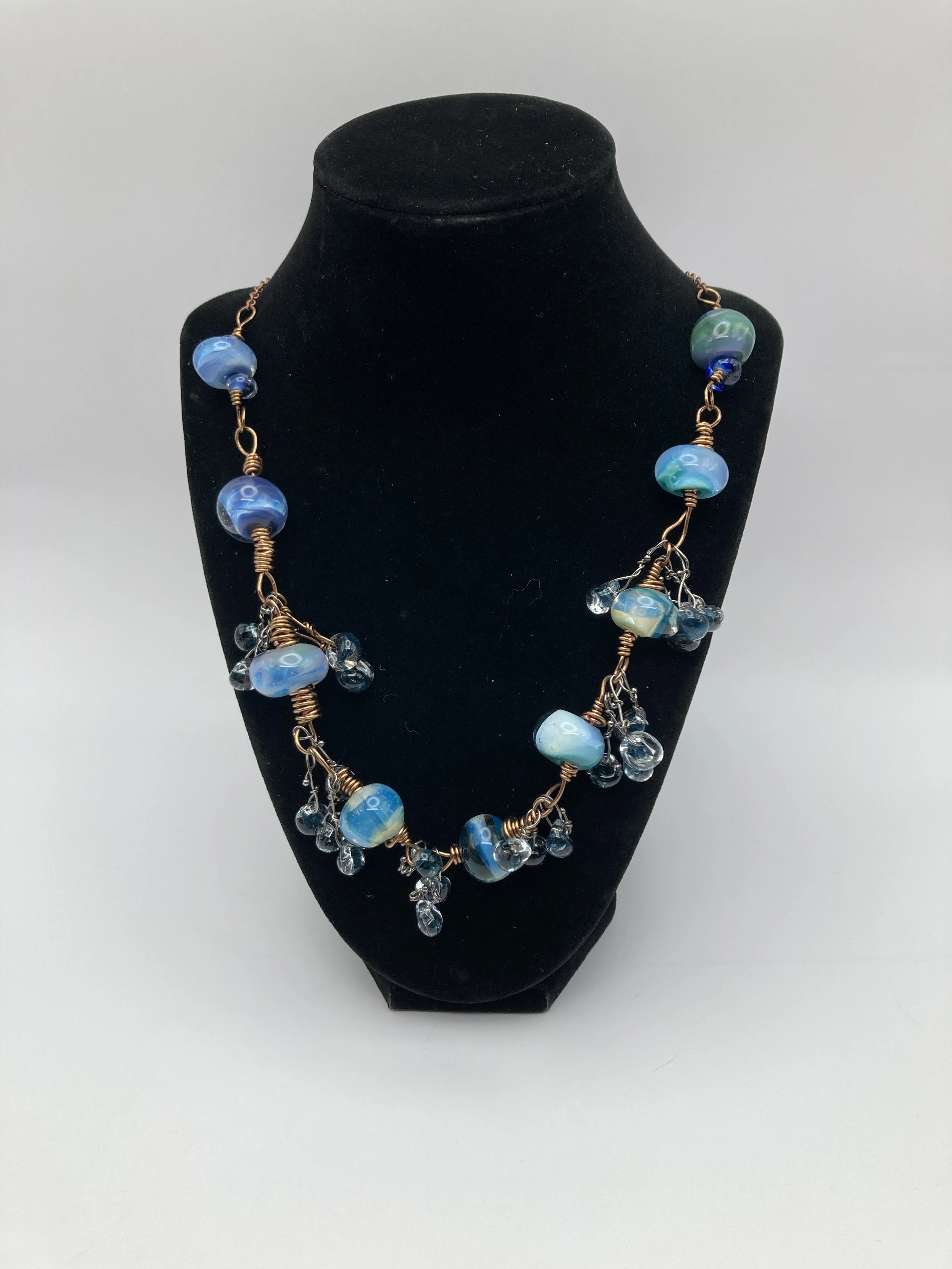 multiple colored glass beads w copper accents