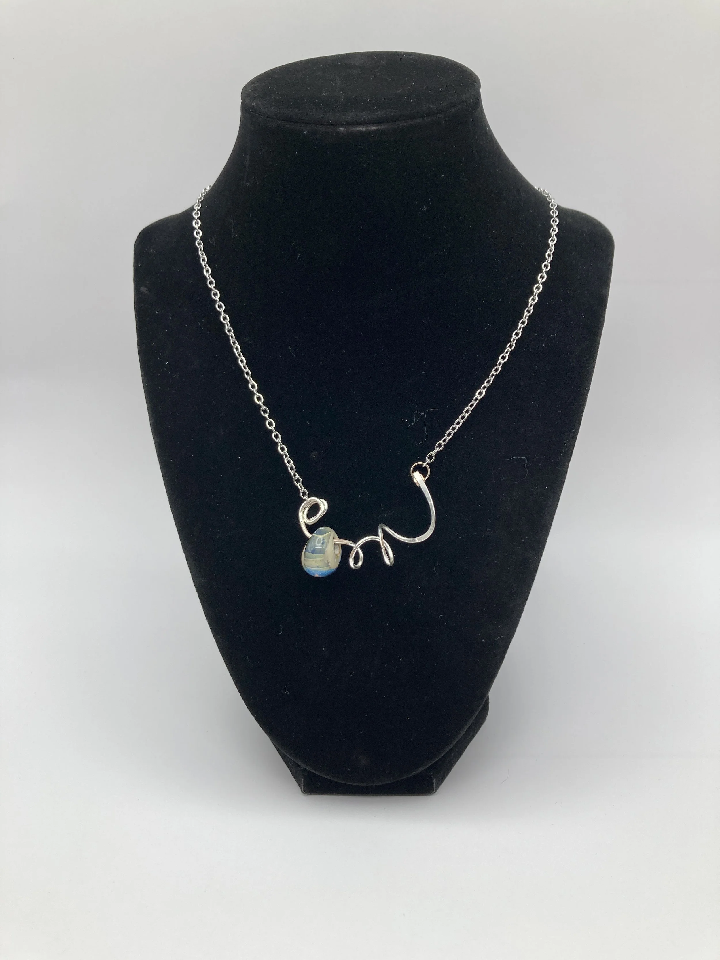 Single special Blue/cream glass beads on curvy decorative wire