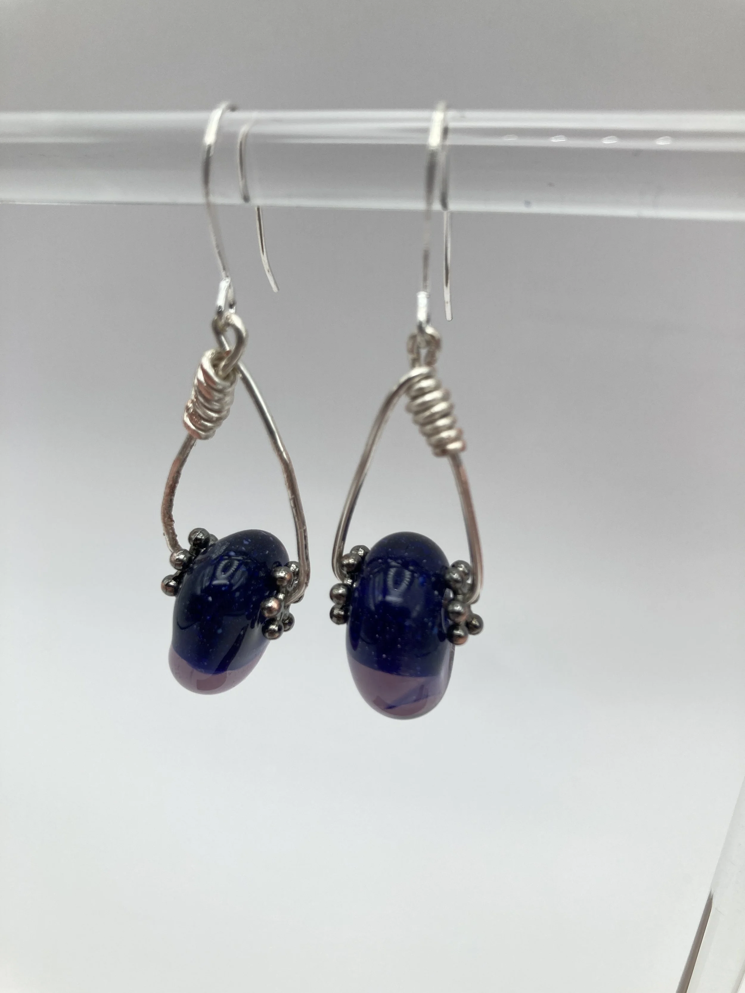 earrings w copper surrounding cream & blue glass beads