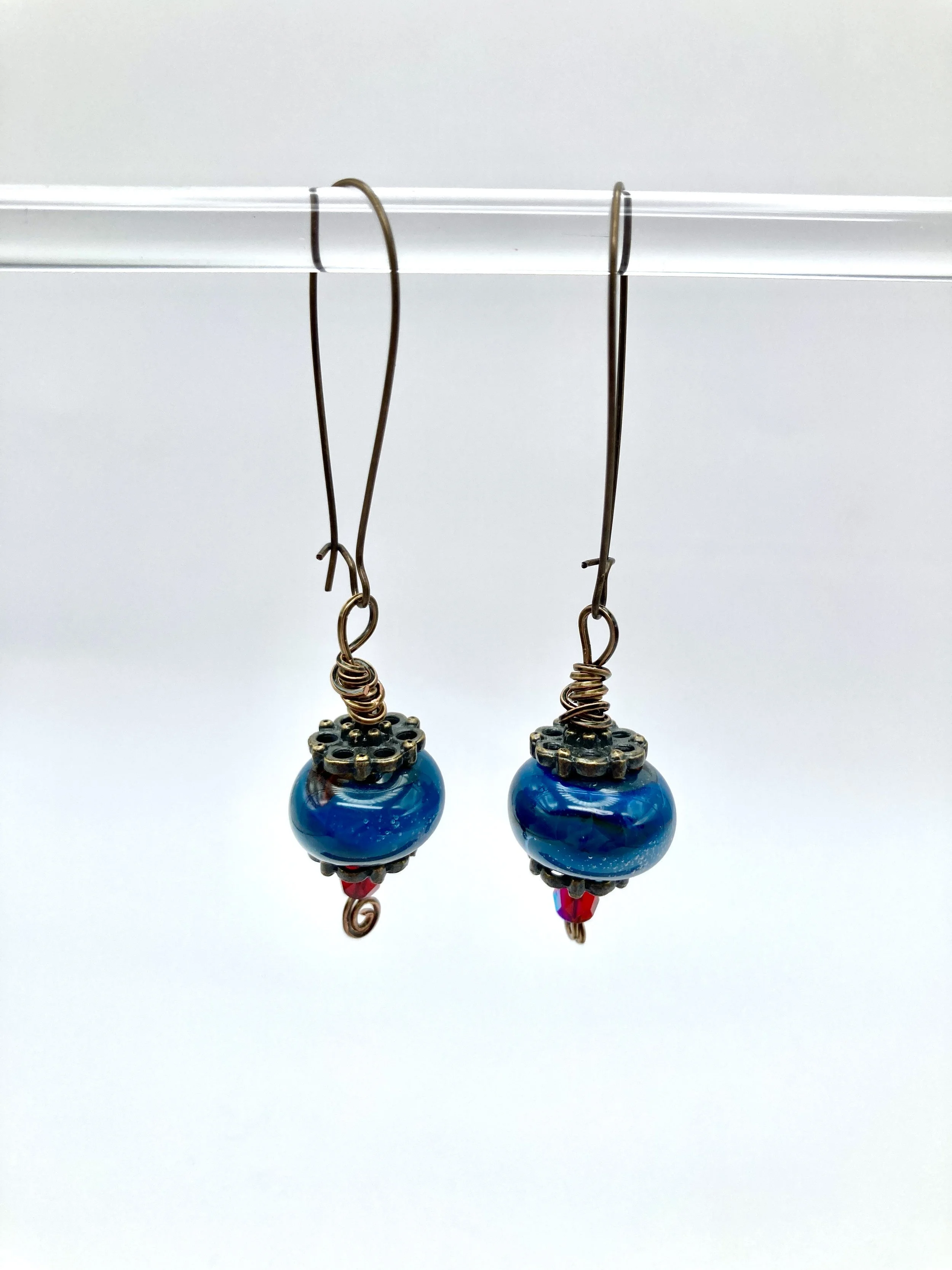 earrings w special blue glass beads on lone wire hanging