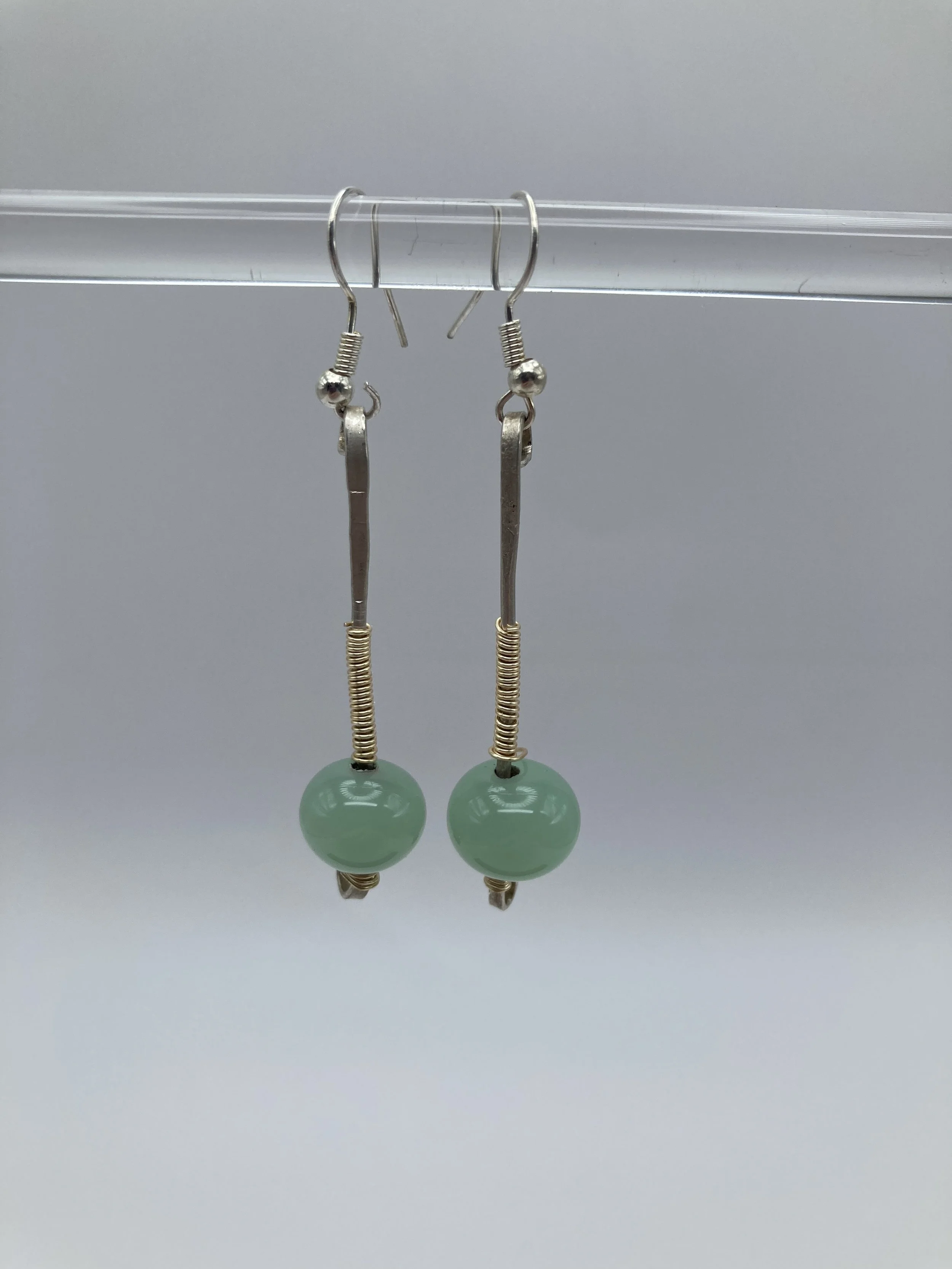 earrings w mint green glass drops on gold wire with silver wrap