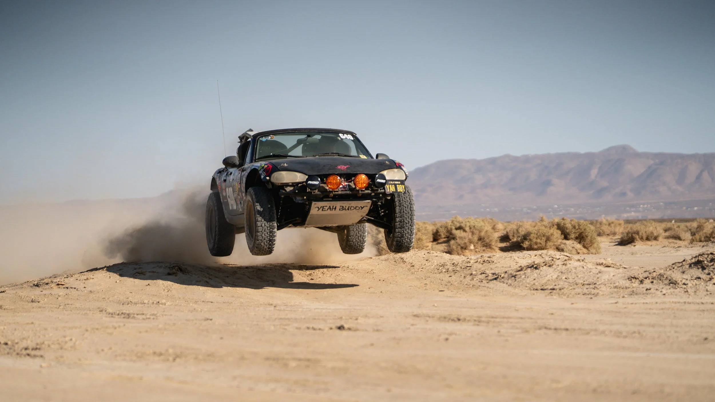 2001 Mazda Miata off road racing jumping