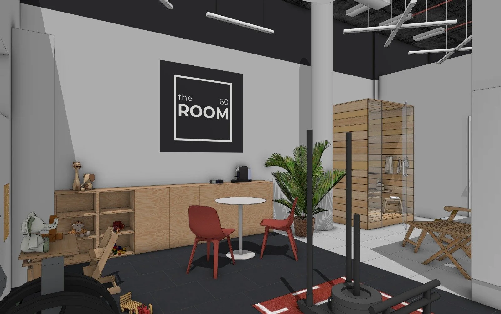 Interior of a modern gym with workout equipment, a shower area, a seating area with red chairs, a plant, and wooden furniture, featuring a sign that says 'the ROOM' on the wall.
