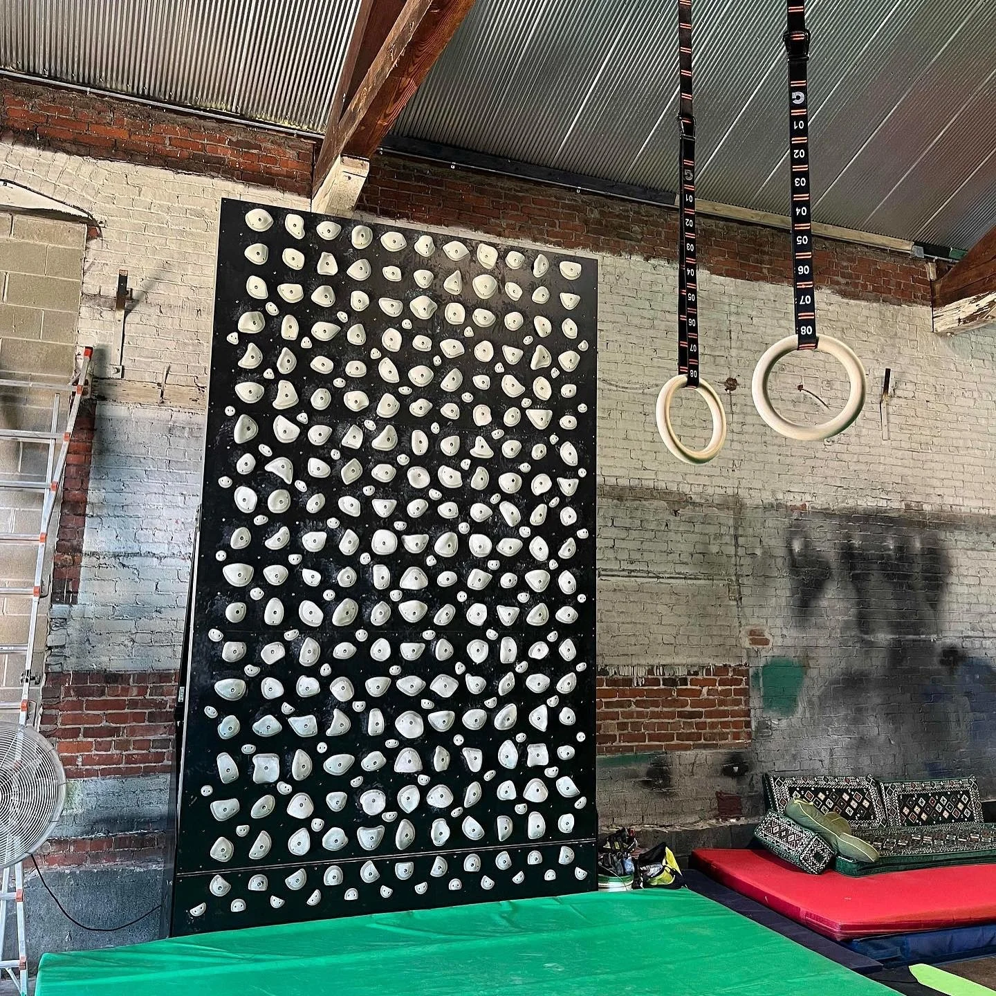 Throwback to a project that we did at @warehouseclimbingco a few years back, setting them up with a 8x12 Board &amp; landing system setup with a @kilterboard!