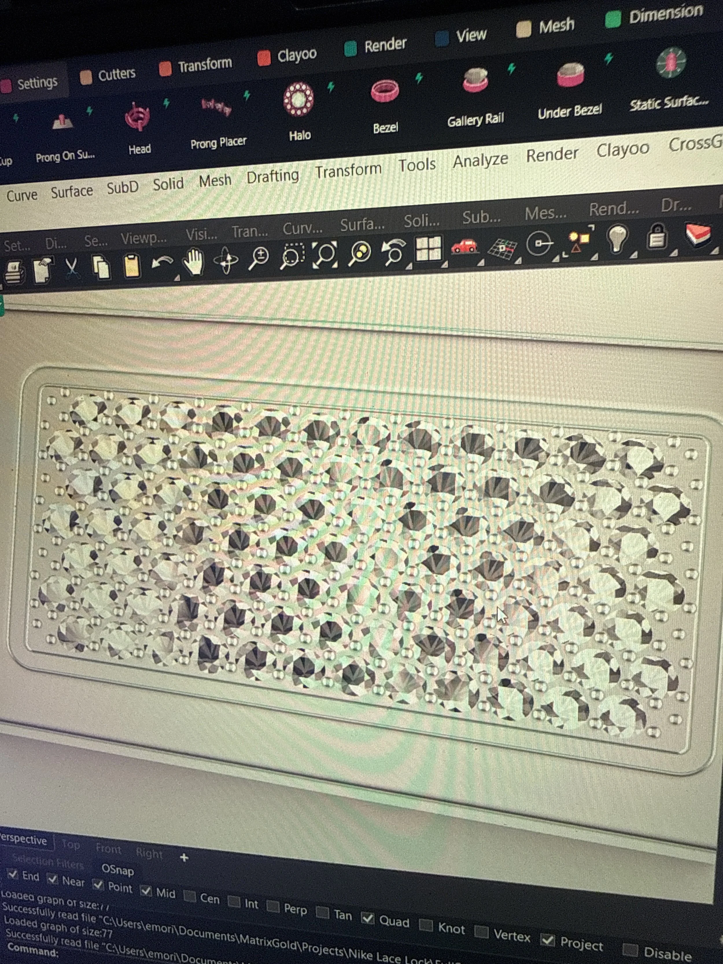Computer screen displaying a 3D modeling software interface with a diamond pattern object in the center.