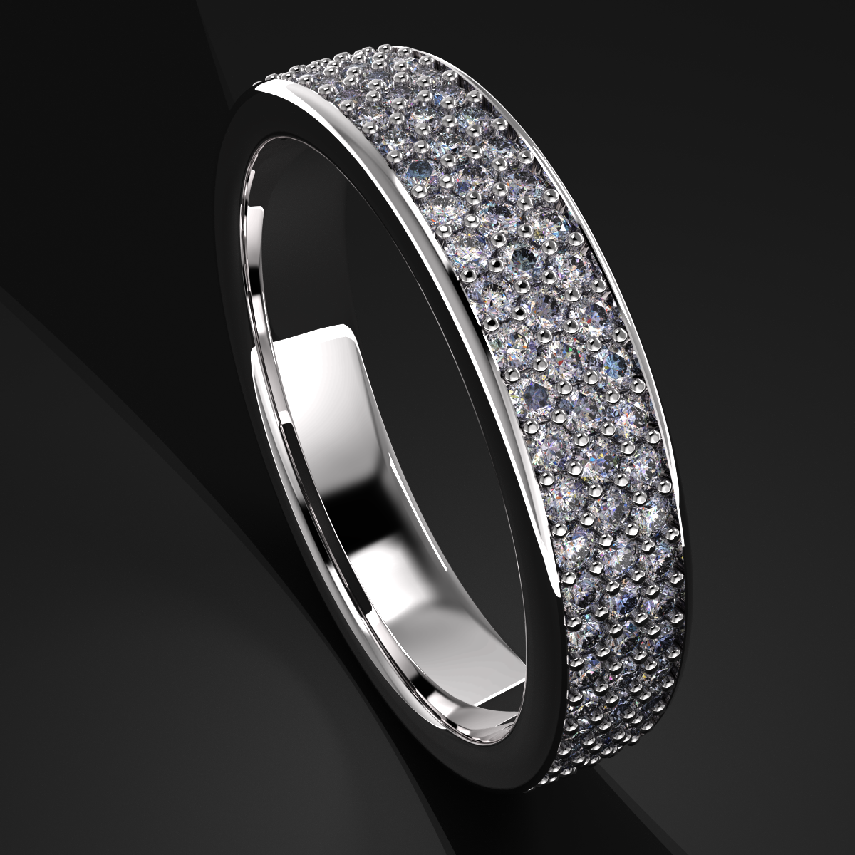 A silver ring encrusted with multiple small diamonds, resting on a black background.