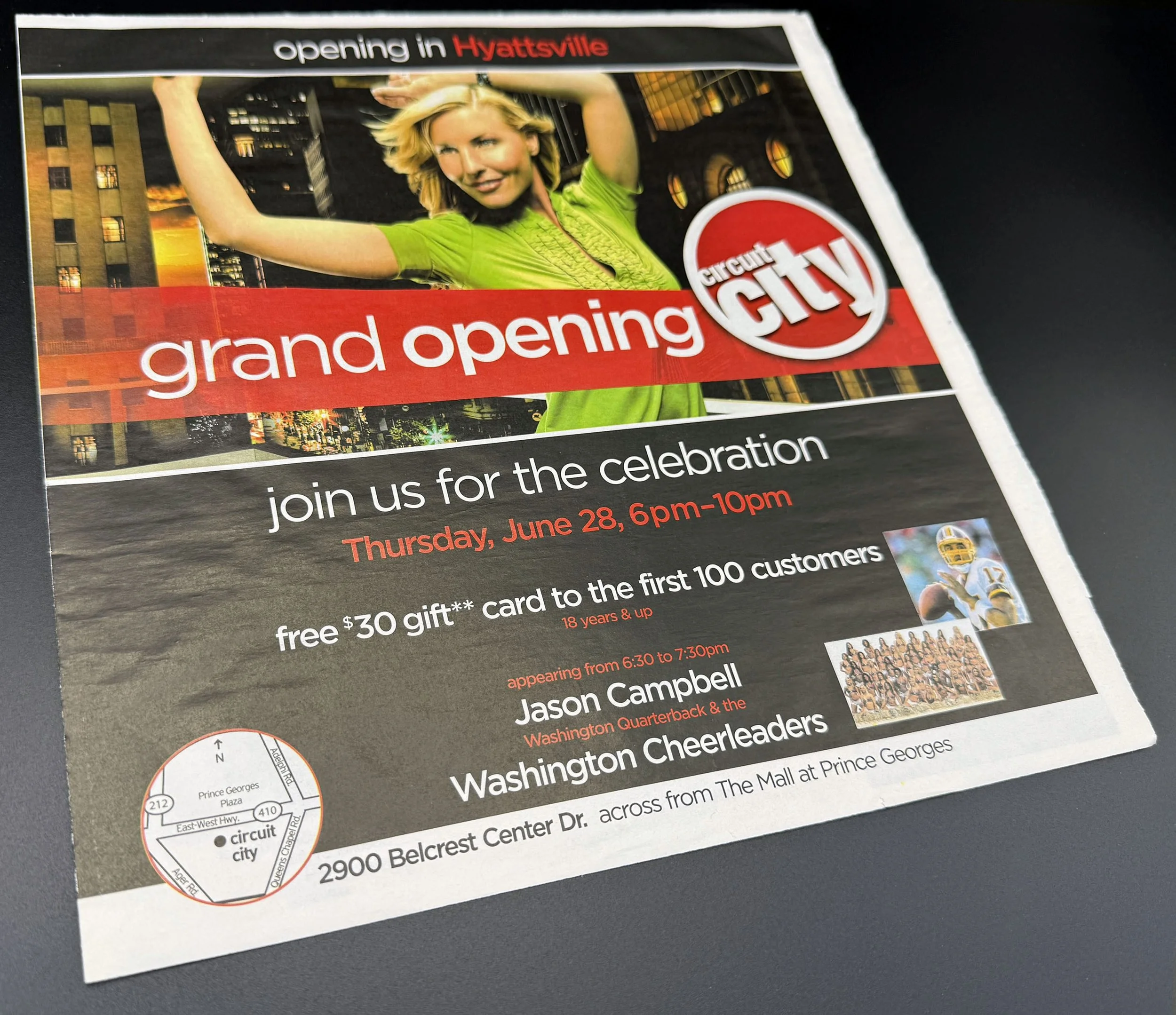 Front cover of a Grand Opening Event newspaper promotional insert.