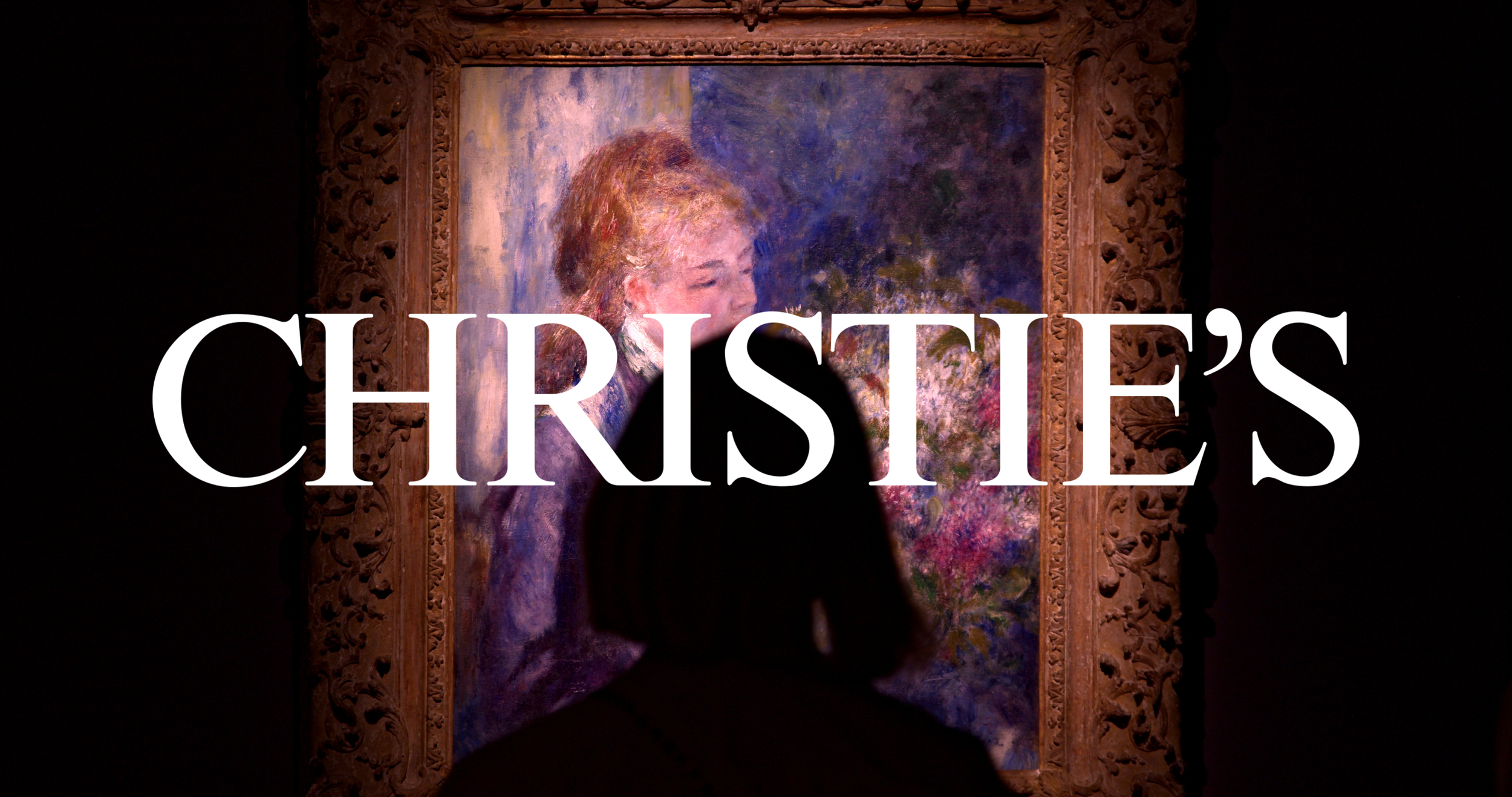 A person standing in front of a painting by Vincent van Gogh at Christie's auction house.