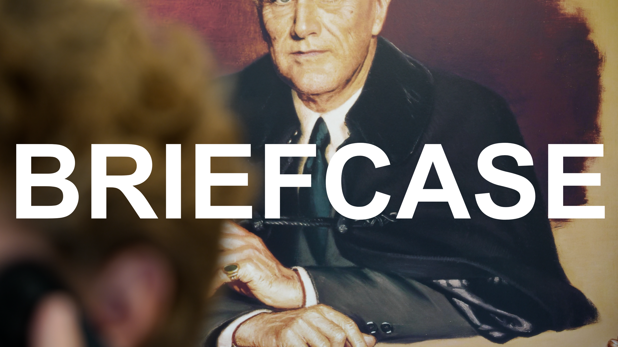 Close-up of a book cover featuring a painting of a serious man in a black jacket, with the word 'BRIEFCASE' written across the image.