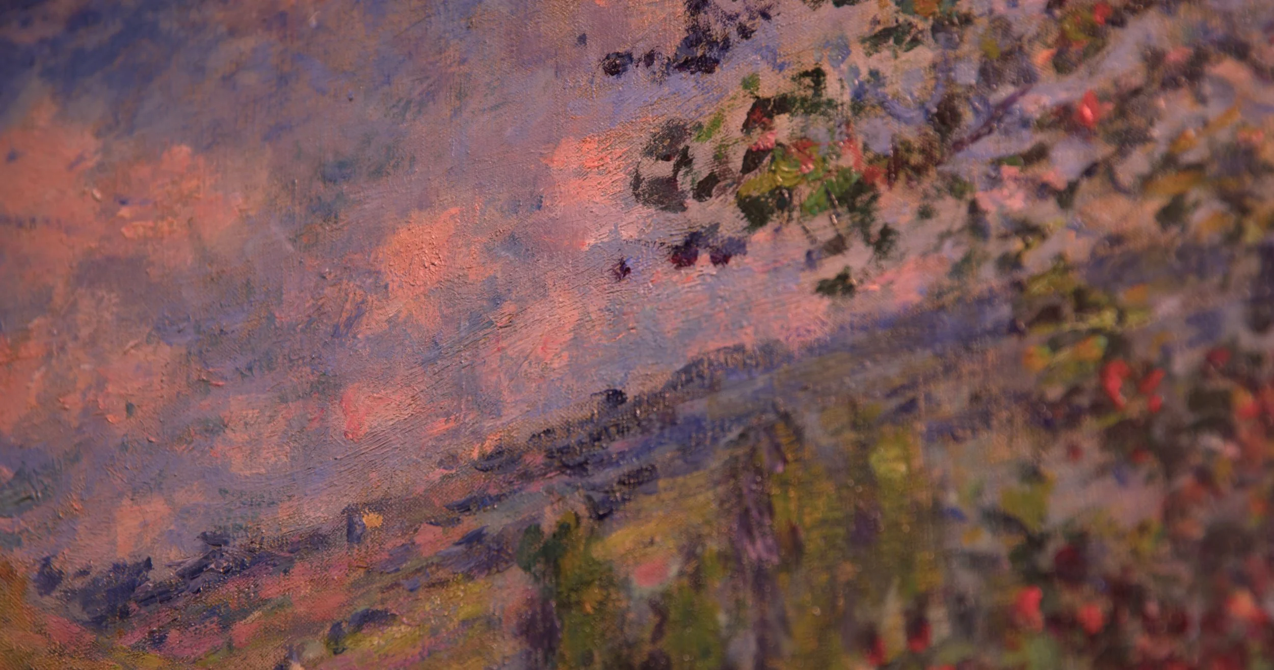 Close-up of a colorful, textured impressionist painting with visible brushstrokes and vibrant colors like pink, purple, green, and orange.