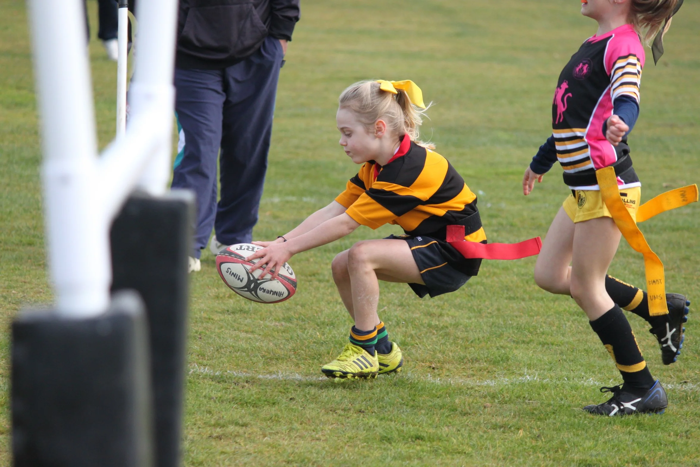 Girl's only festival - Young girl putting ball on try line