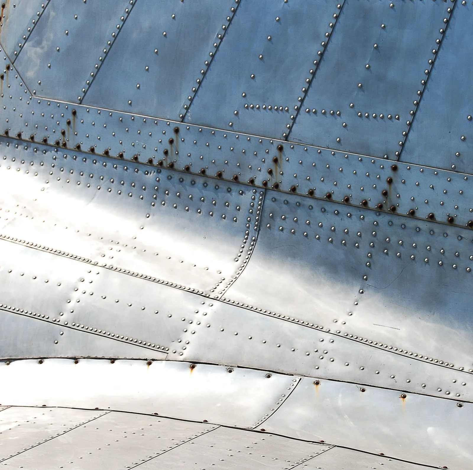 Stitched in Steel / Download