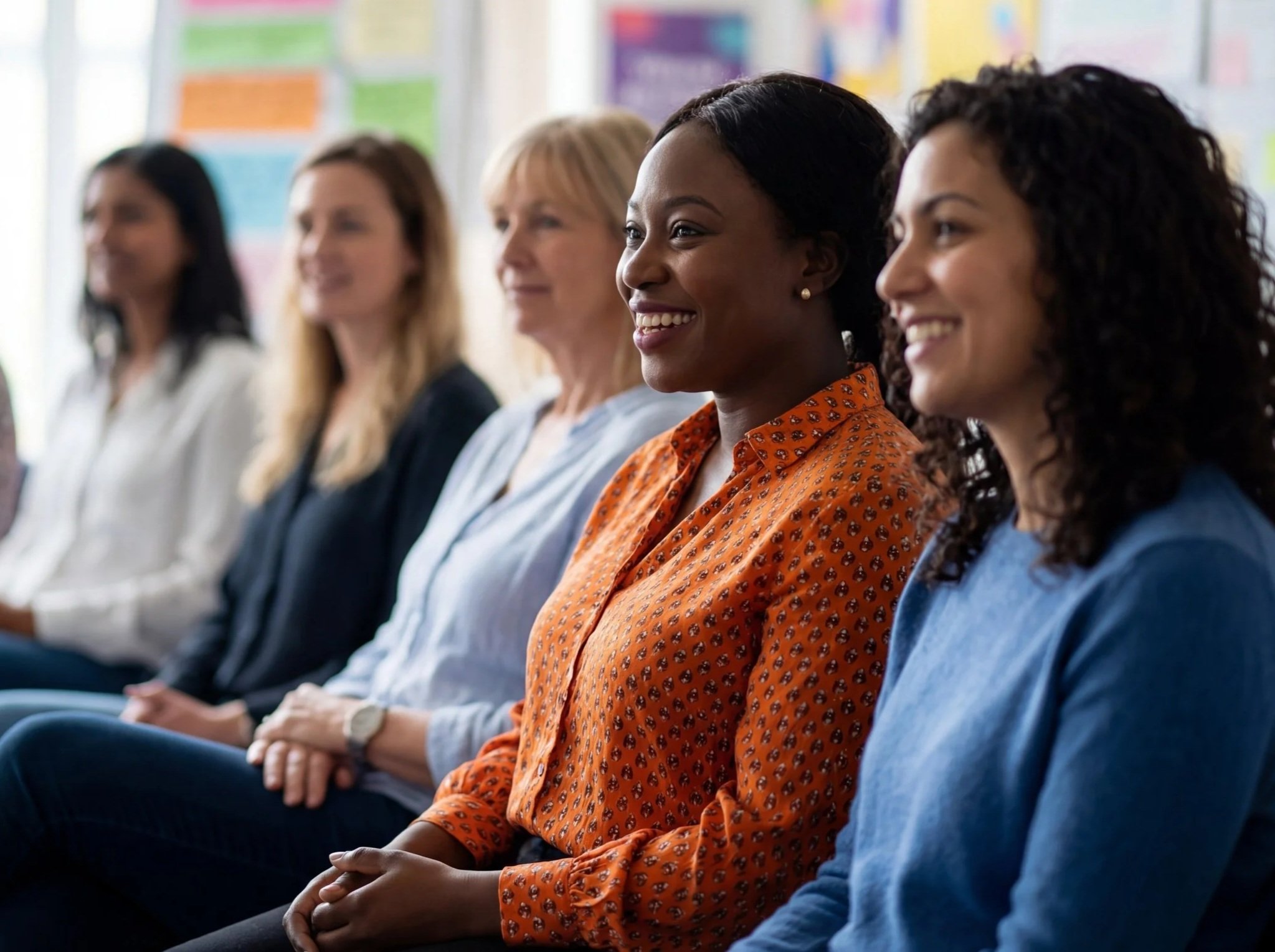 row of ladies sitting in a presentation