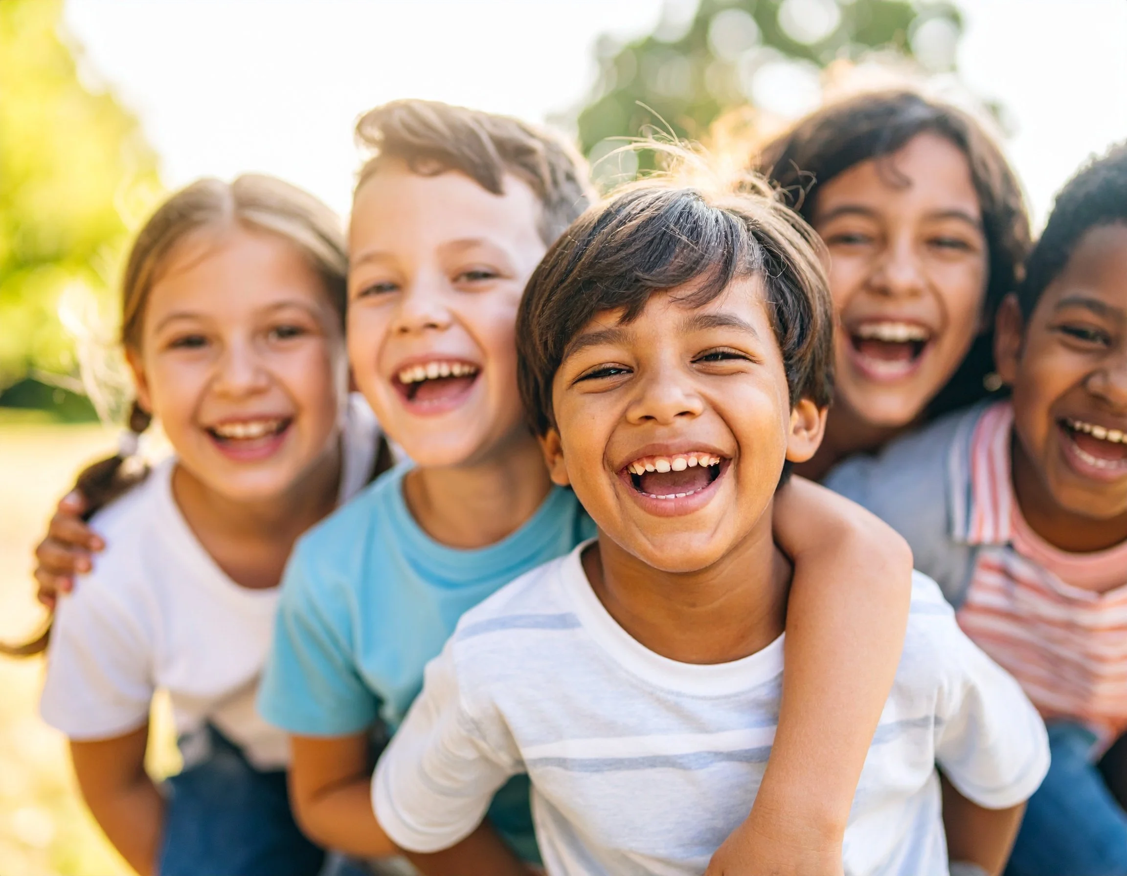 Multicultural group of kids hanging out