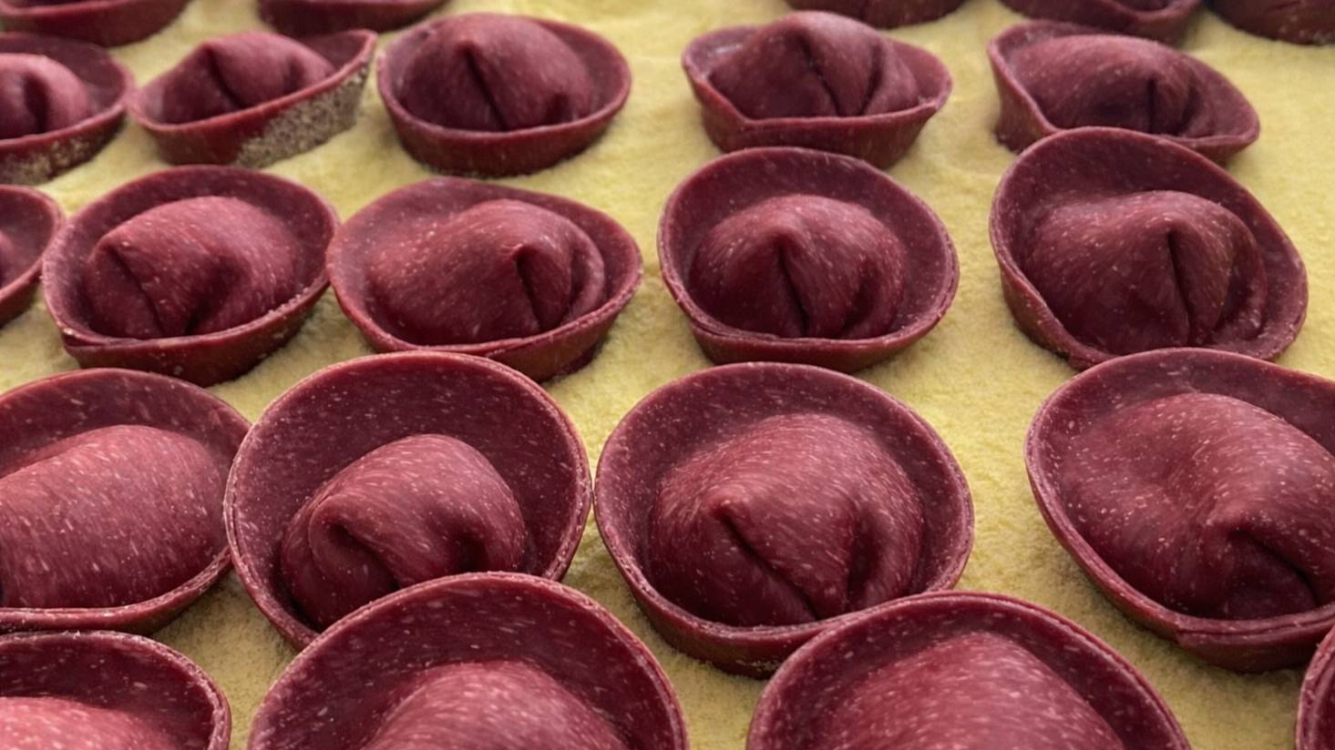 Handmade Beet Tortellini filled with cashew ricotta 