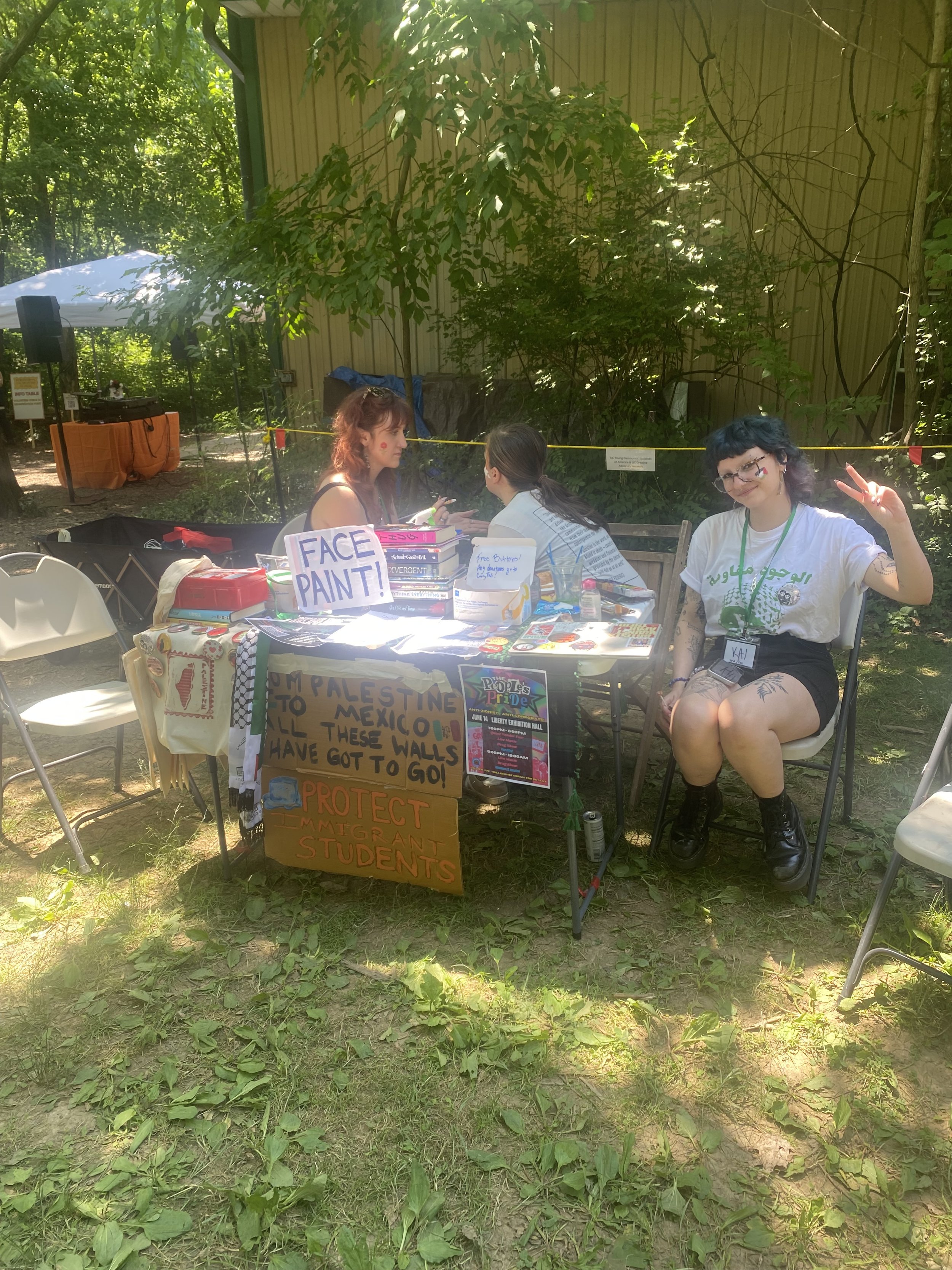 The Creative Advocacy Network's table at the festival
