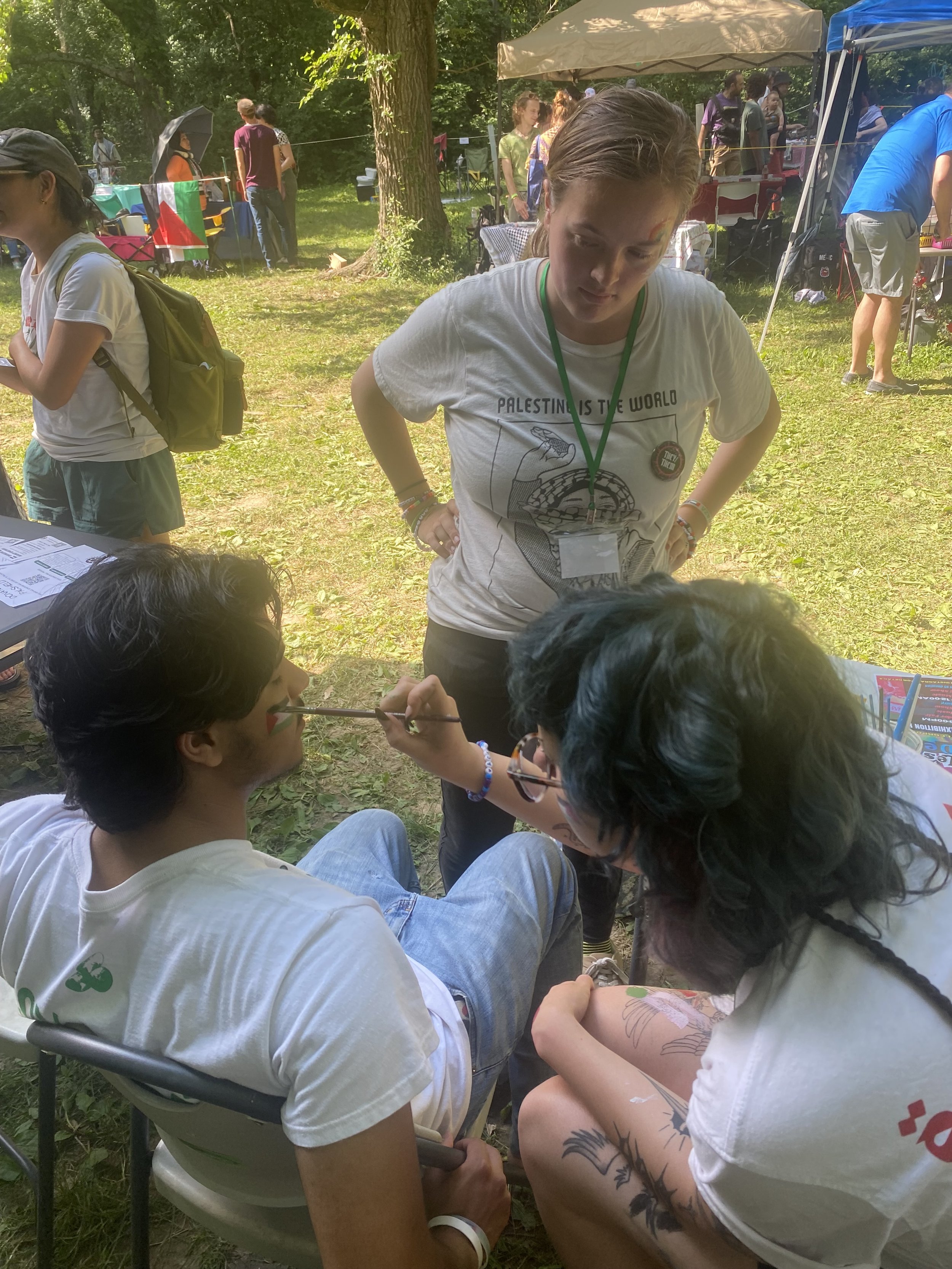 myself (Kai) painting the face of my friend
