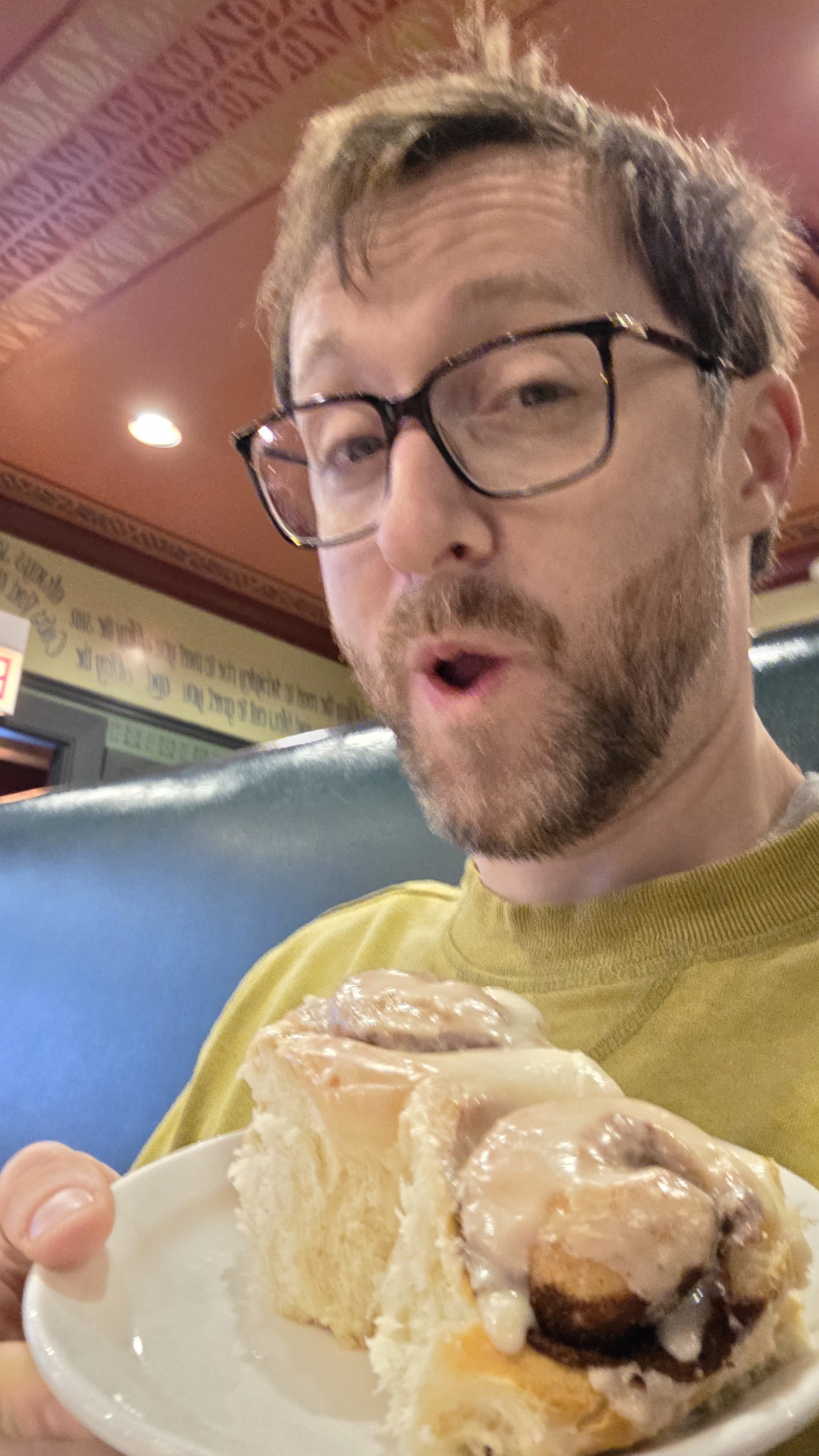 matthew creamer - traveling - life coach - tries cinnamon rolls at ann sather