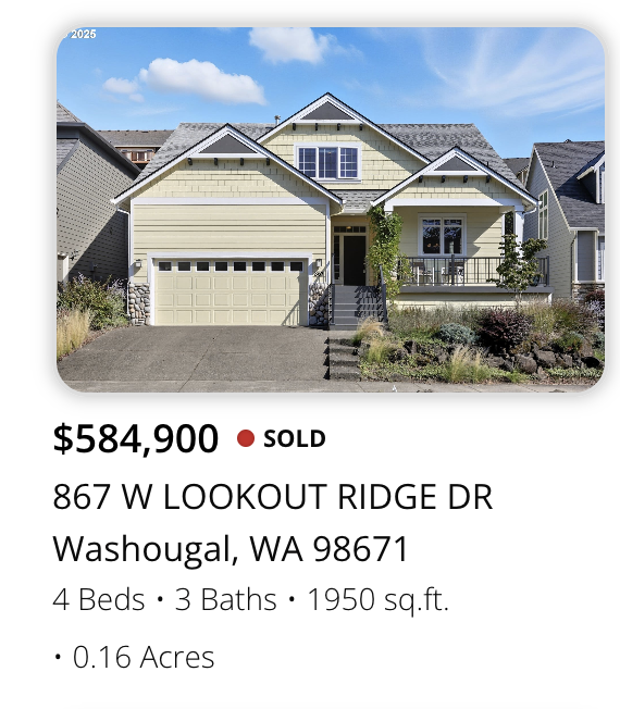 Front view of a yellow two-story house with a garage, staircase leading to the front door, and landscaped yard, located at 867 W Lookout Ridge Dr, Washougal, WA.