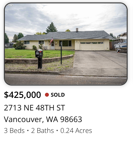 Front view of a single-story house with a driveway, a lawn, and a mailbox, in Vancouver, Washington.