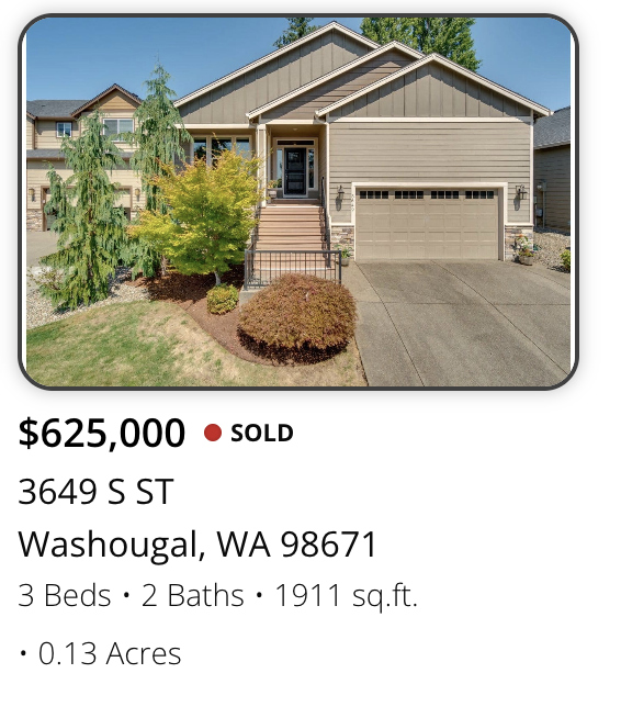 Front exterior view of a beige, modern, two-story house with an attached garage, steps leading to the front door, and landscaped lawn with a green tree and bush.