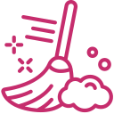 Pink illustration of a broom sweeping bubbles and sparkles.