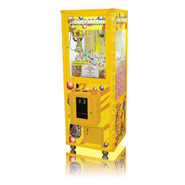 Yellow candy crane claw machine filled with assorted candies and toys.