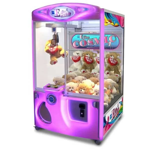 Pink claw machine arcade game filled with teddy bears, some holding red hearts, inside a colorful arcade setting.