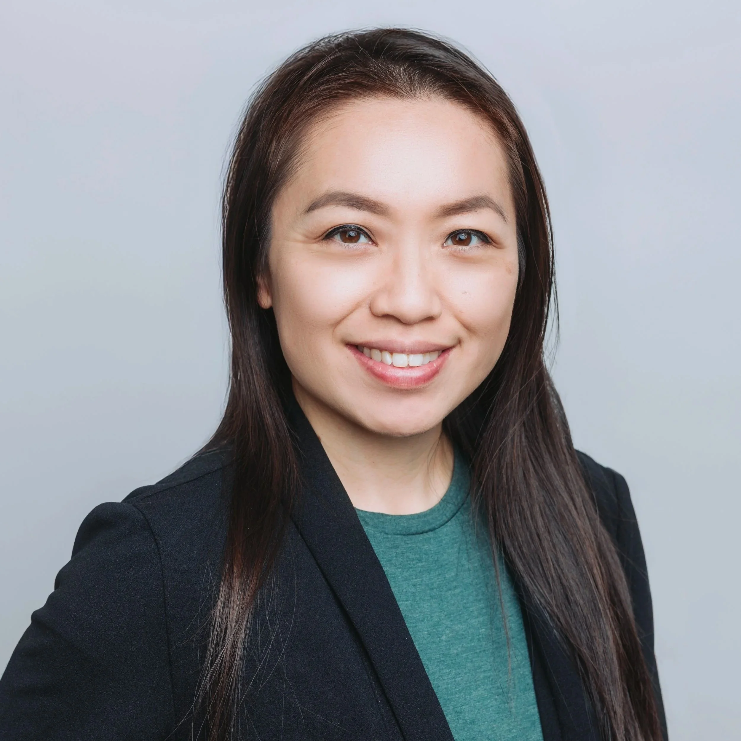 A portrait of Tracy Lam-Luu D.C. founder and owner of CoreShift Chiropractic & Wellness in Upland, CA.