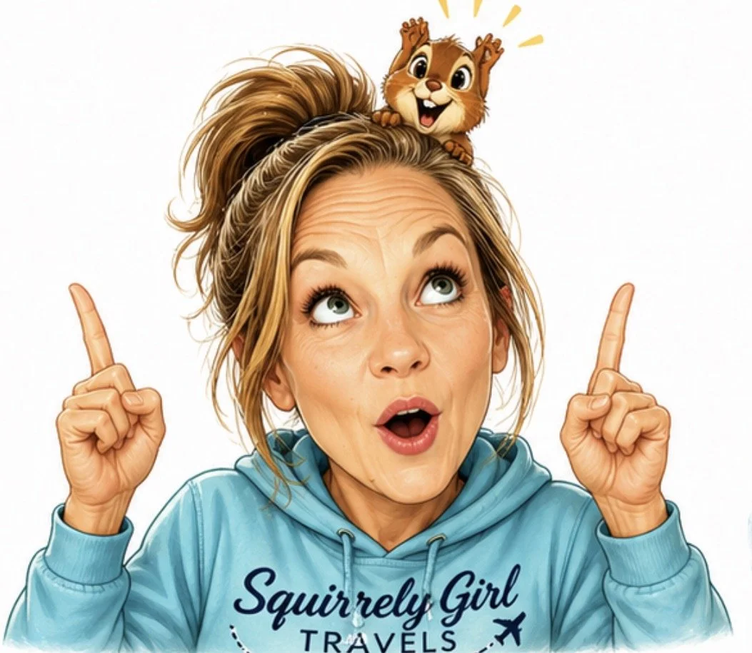 A woman with blonde hair in a messy bun, wearing a blue hoodie that says "Squirrely Girl Travels," is pointing upward with both index fingers. A cartoon squirrel with big eyes and a wide smile is perched on her head, appearing excited.