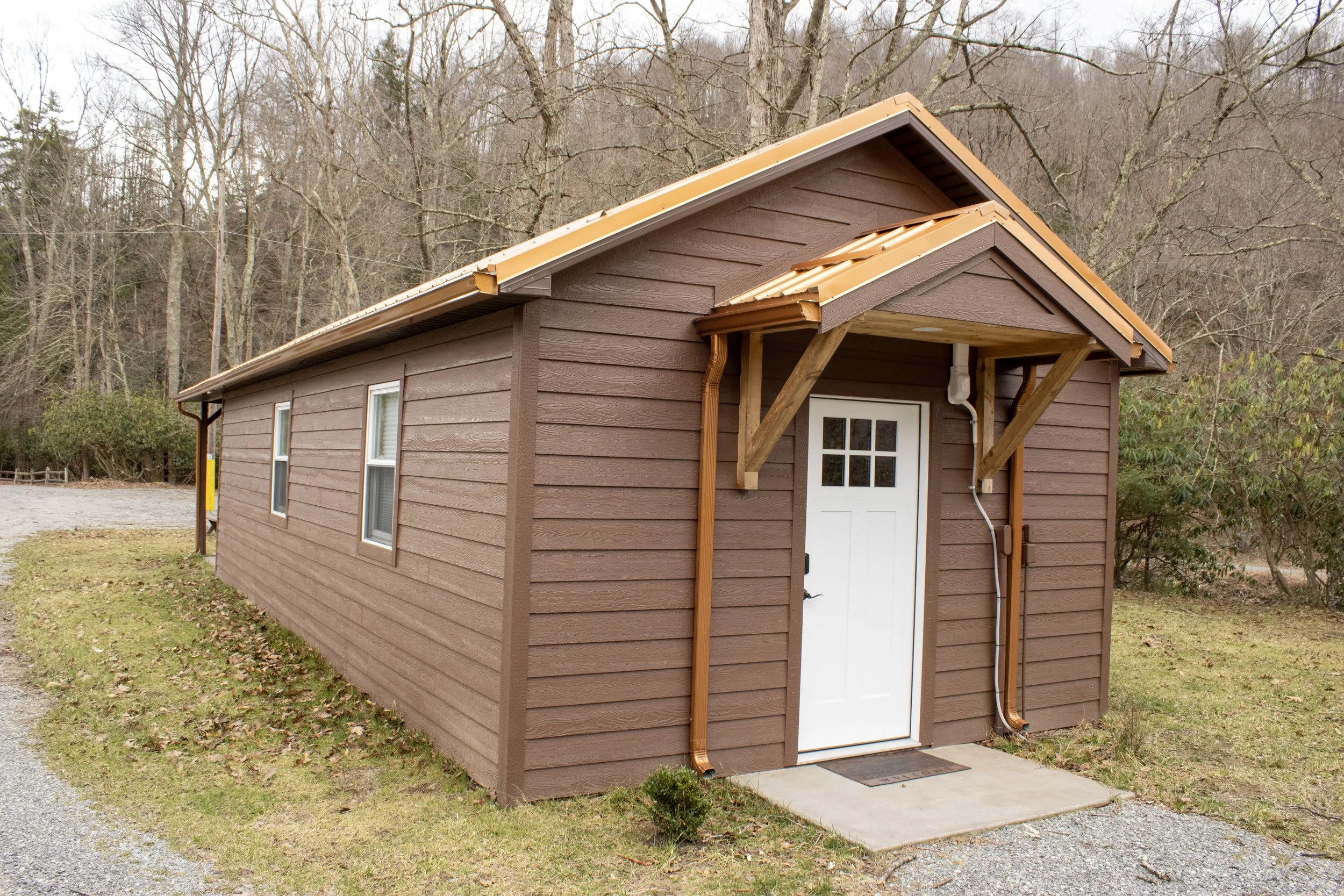 1 bed cabin front door  angled.JPG