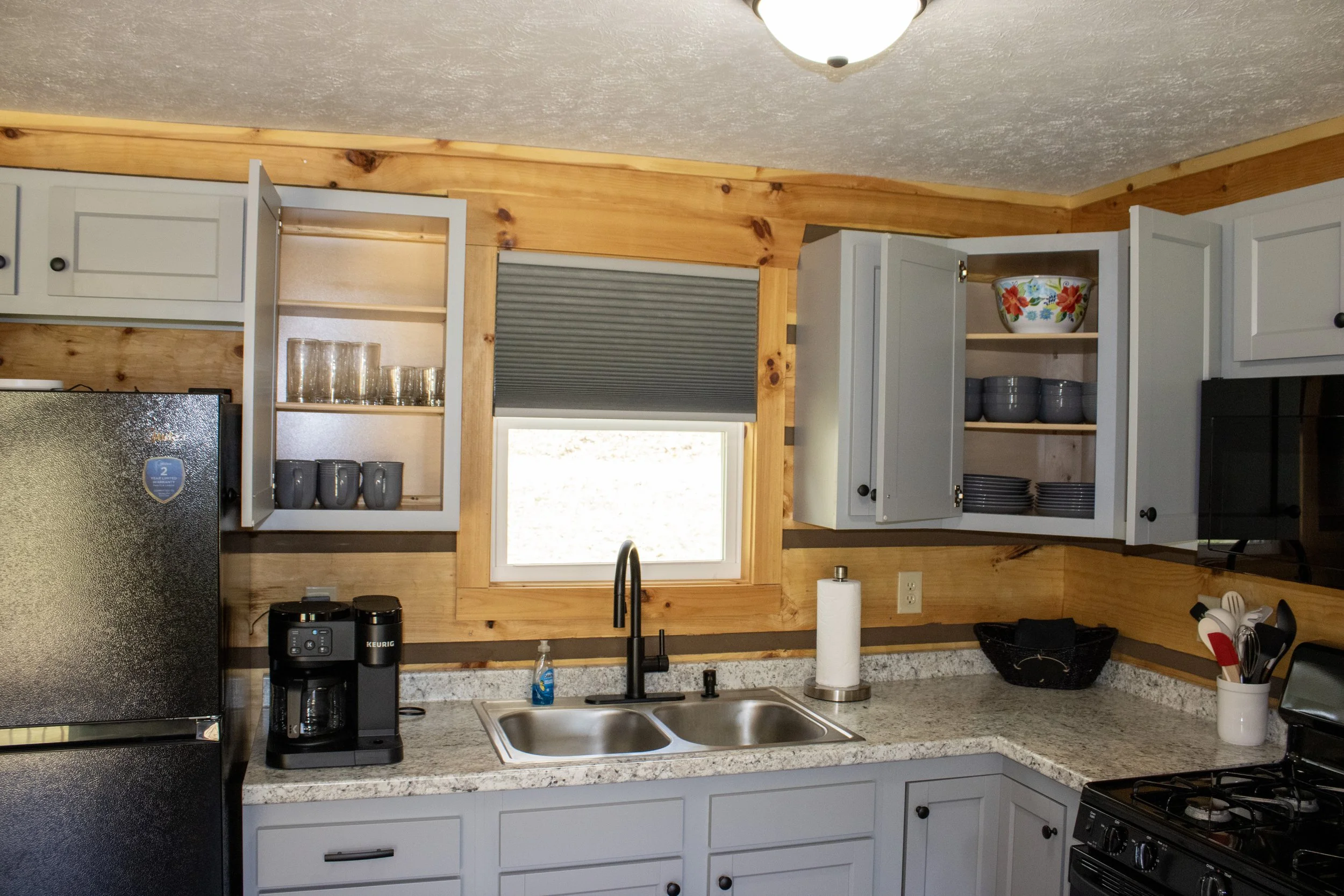 2 Bed cabin Kitchen Open Cabinets.JPG