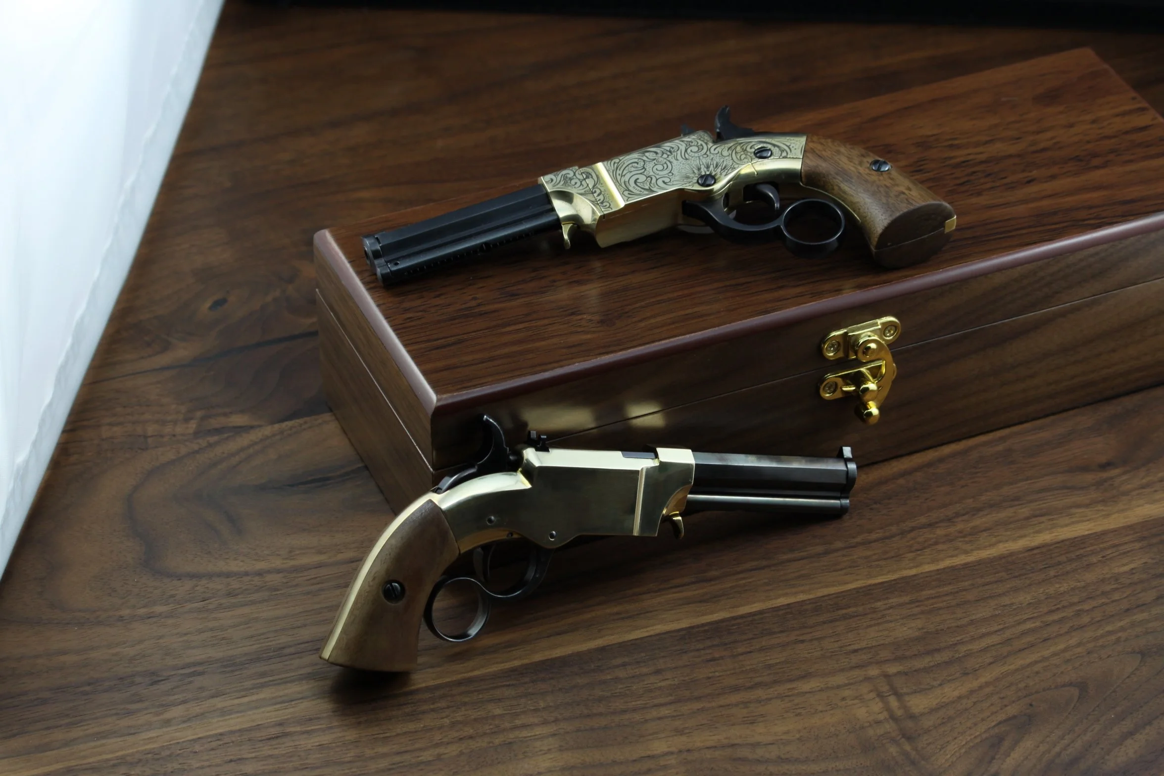 VOLCANIC PISTOL miniature side by side 2.JPG